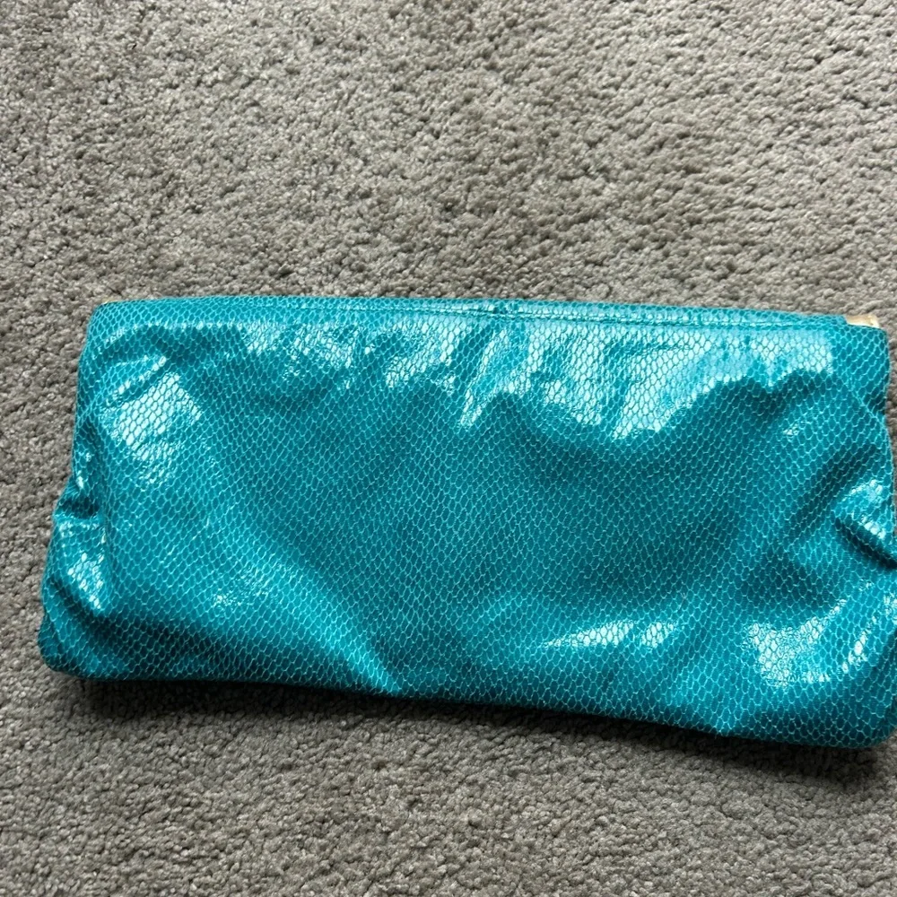 Kenneth Cole‎ Reaction Clutch